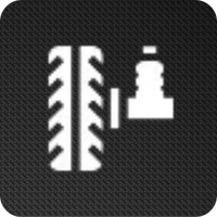 A black and white icon of a tire and a jack.