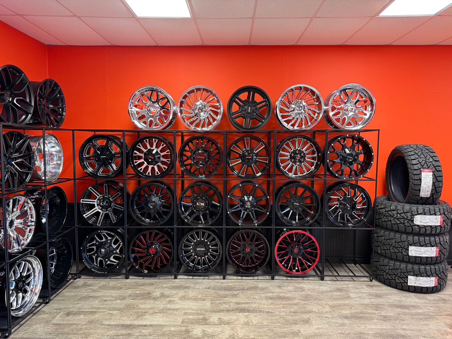 A room filled with lots of wheels and tires.
