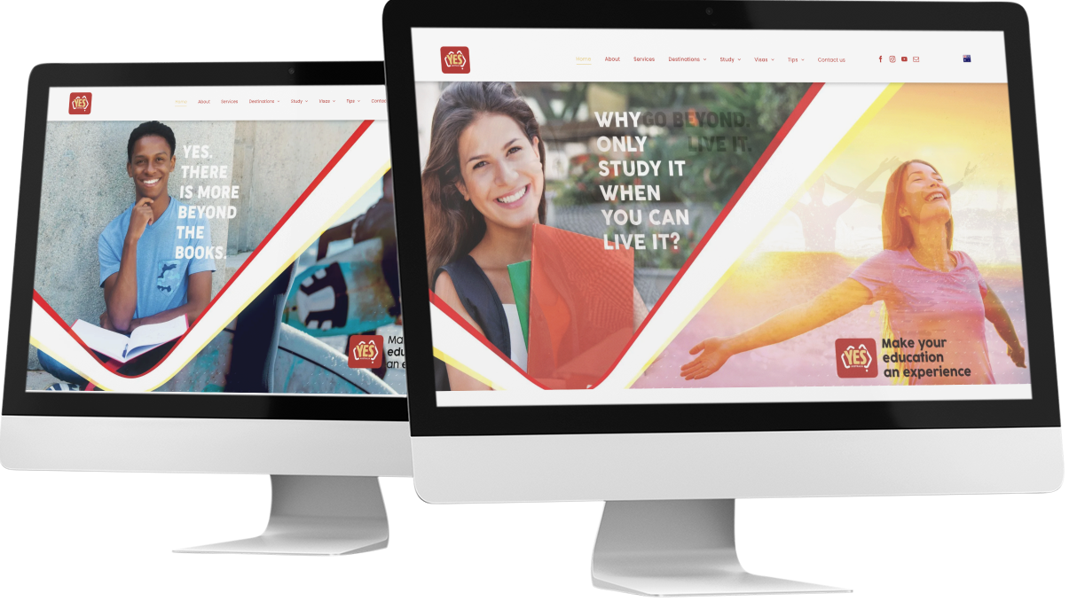 Two computer monitors with a website on them.