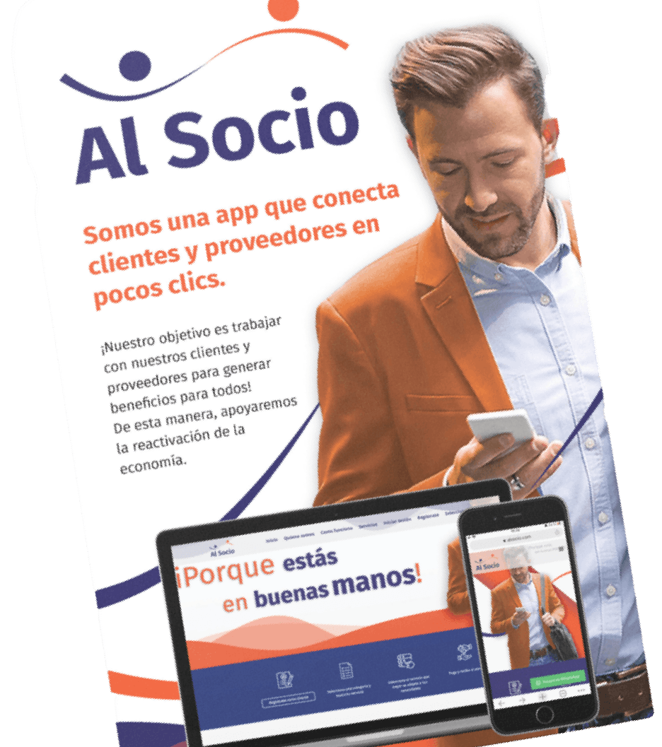 A man is holding a cell phone next to a laptop and a phone.