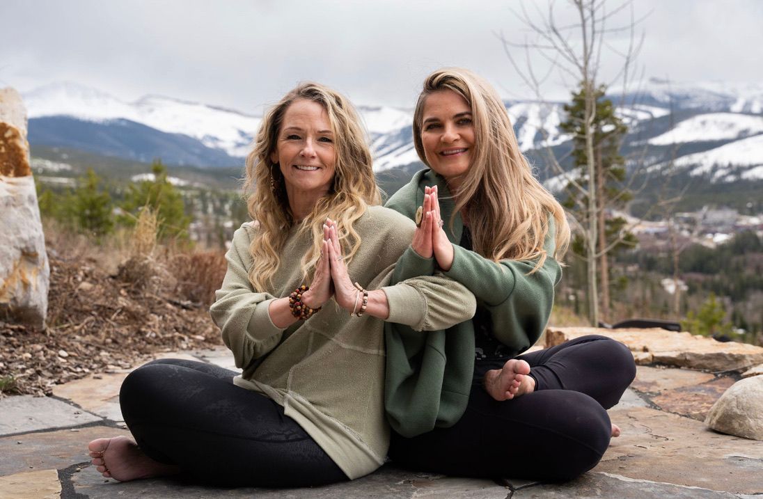 Close-up of smiling faces of yogis enjoying their practice together