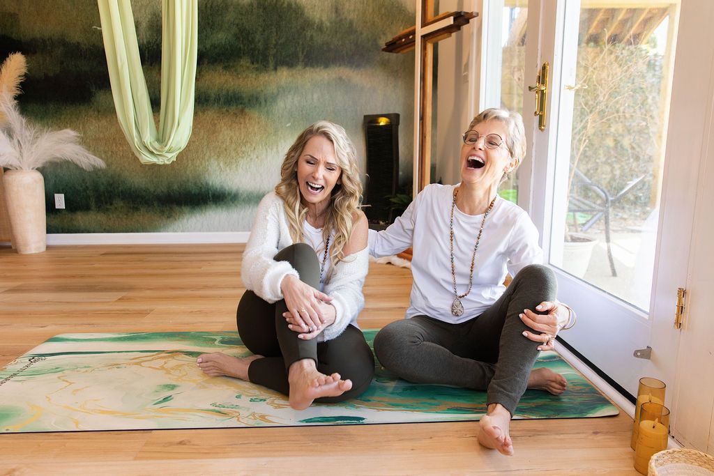Instructor at Worthy + Wyld Wellness leading a faith-based yoga class, promoting spiritual growth and healing