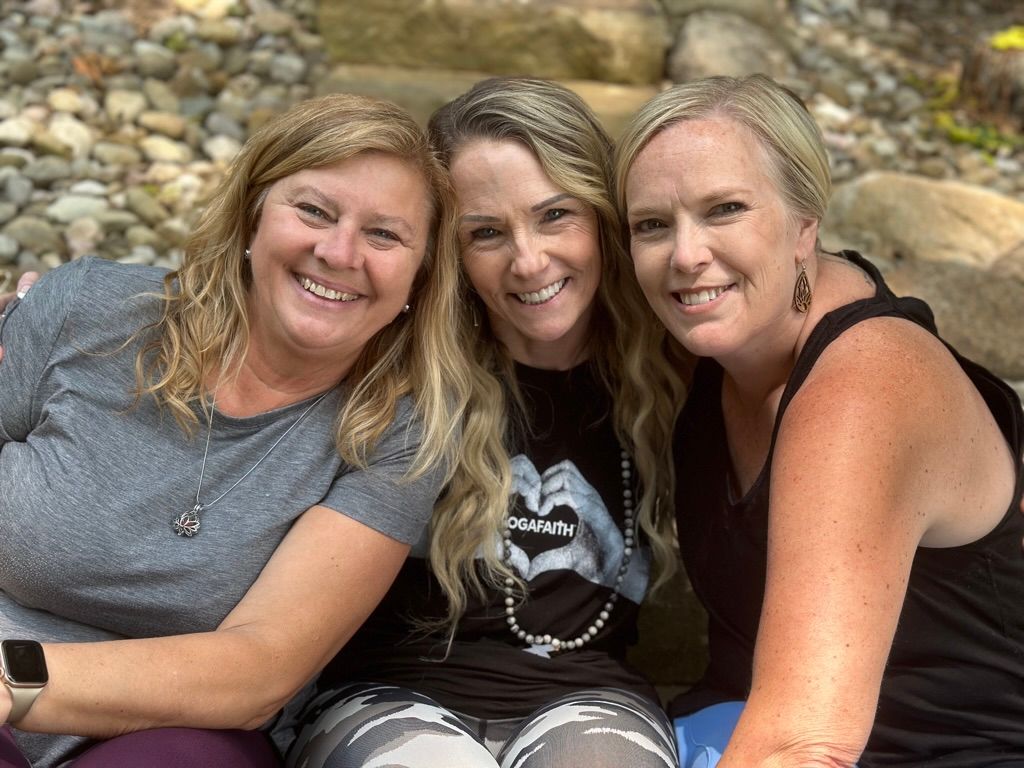 Worthy and Wyld yoga students celebrating progress at a retreat event