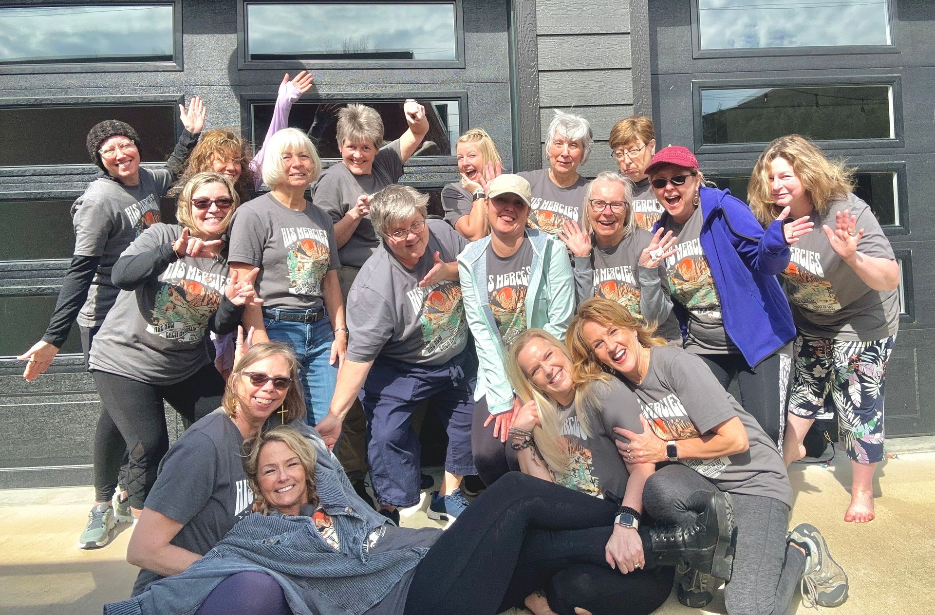 Diverse group of yoga practitioners supporting each other in a meditation circle