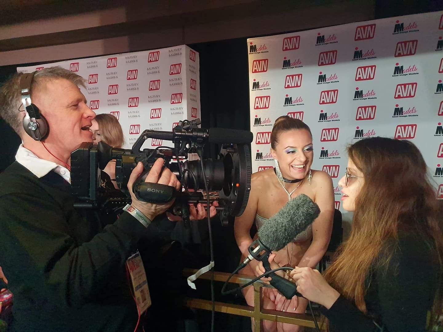 Interview AVN Denice K / Denice Klarskov camera filming an interview with Pornstar Denice K