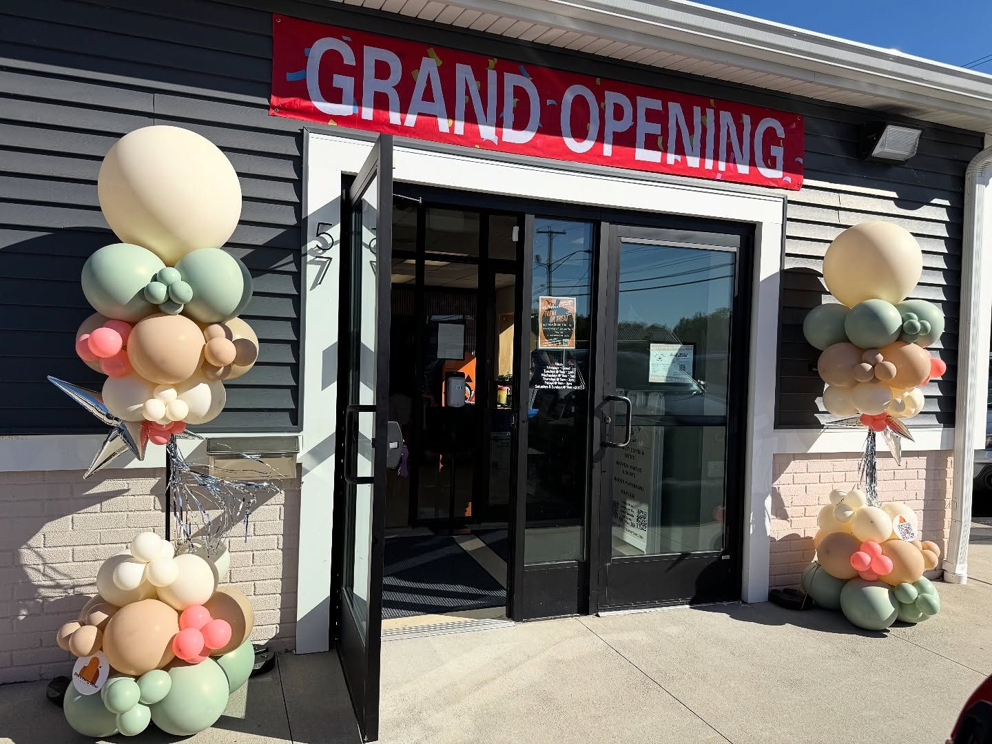 Grand opening storefront balloon decor with pastel arches, Rhode Island