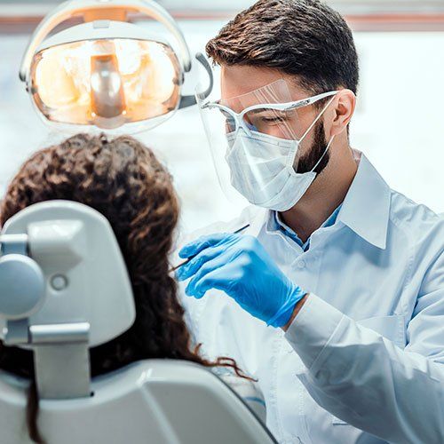 Dentist Working — Leominster, MA — Lanza Dental Office