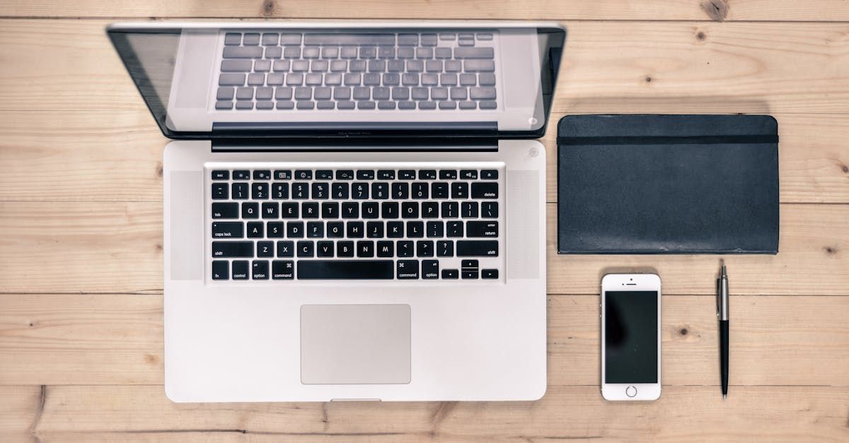 Image of a computer, phone and tablet on a desk. Click this photo to read this blog post!