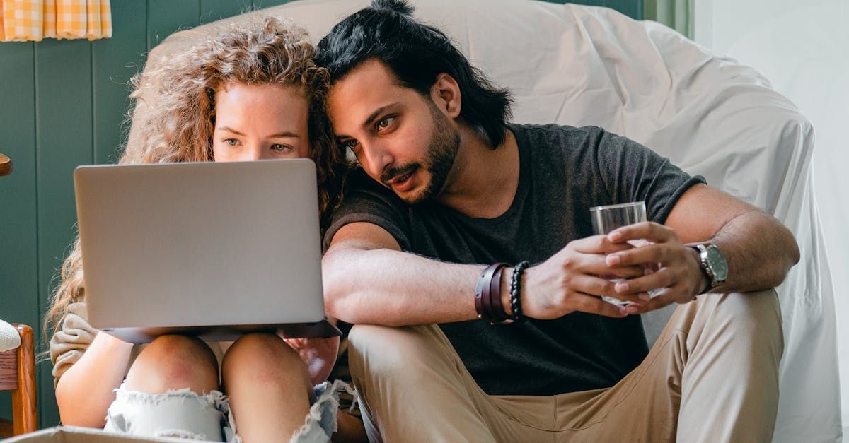 Image of a couple looking at a computer screen