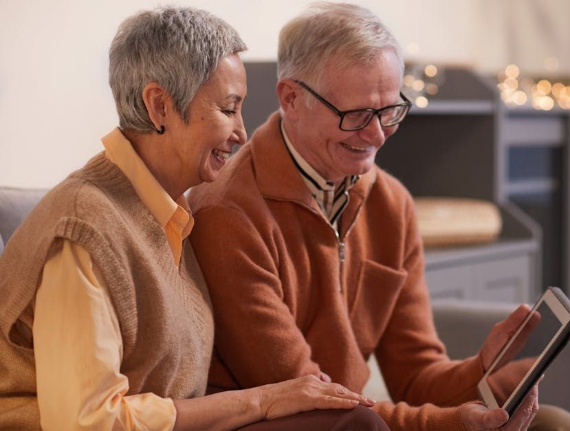 Image of two people going through an estate plan on a tablet