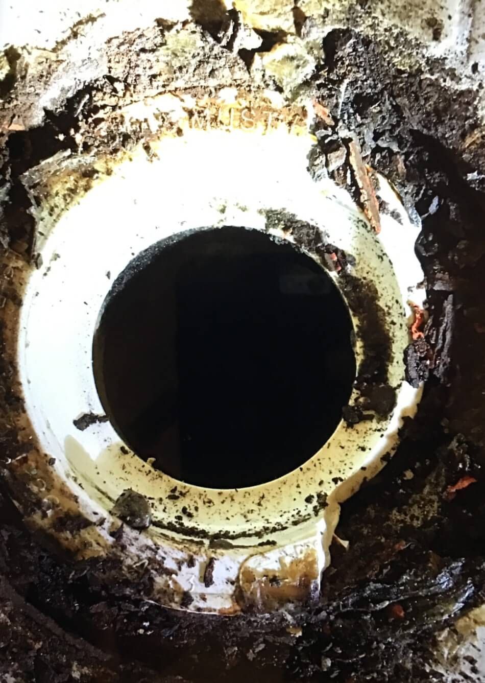 A close up of a hole in the ground