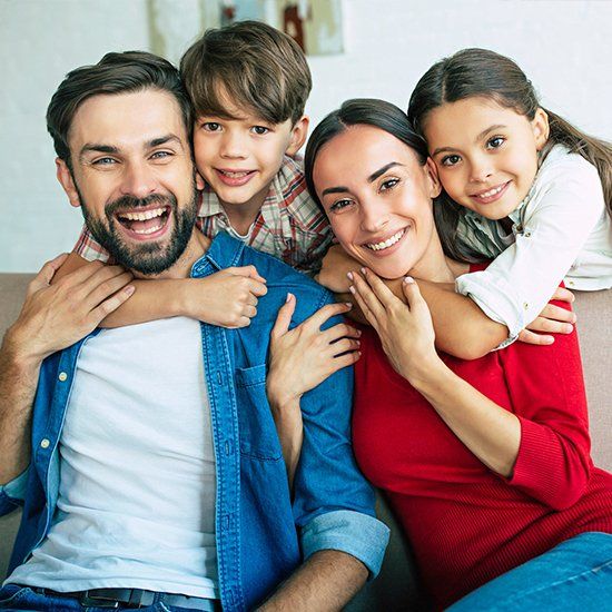 Happy Family Having Fun at Home — York County, PA — Feeser Insurance & Notary