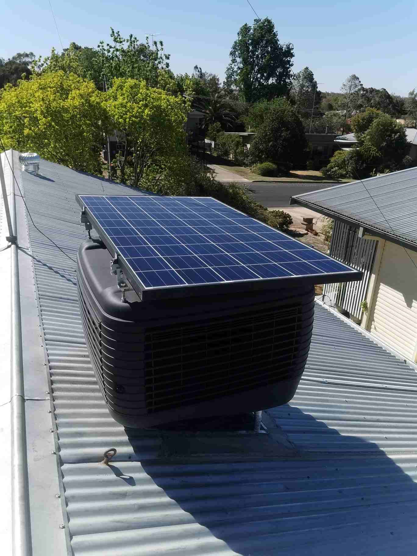 A Solar Panel is Sitting on Top of a Metal Roof — Sapphire City Solar & Electrical In Tenterfield, NSW