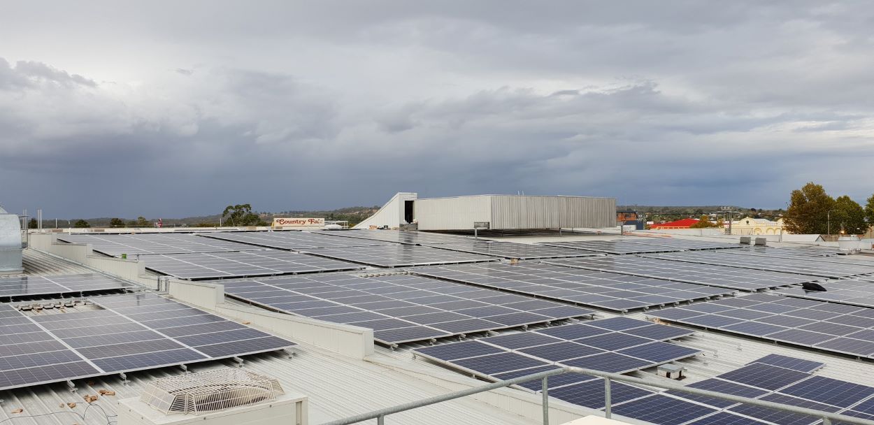 There Are a Lot of Solar Panels on the Roof of a Building β Sapphire City Solar & Electrical In Inverell, NSW