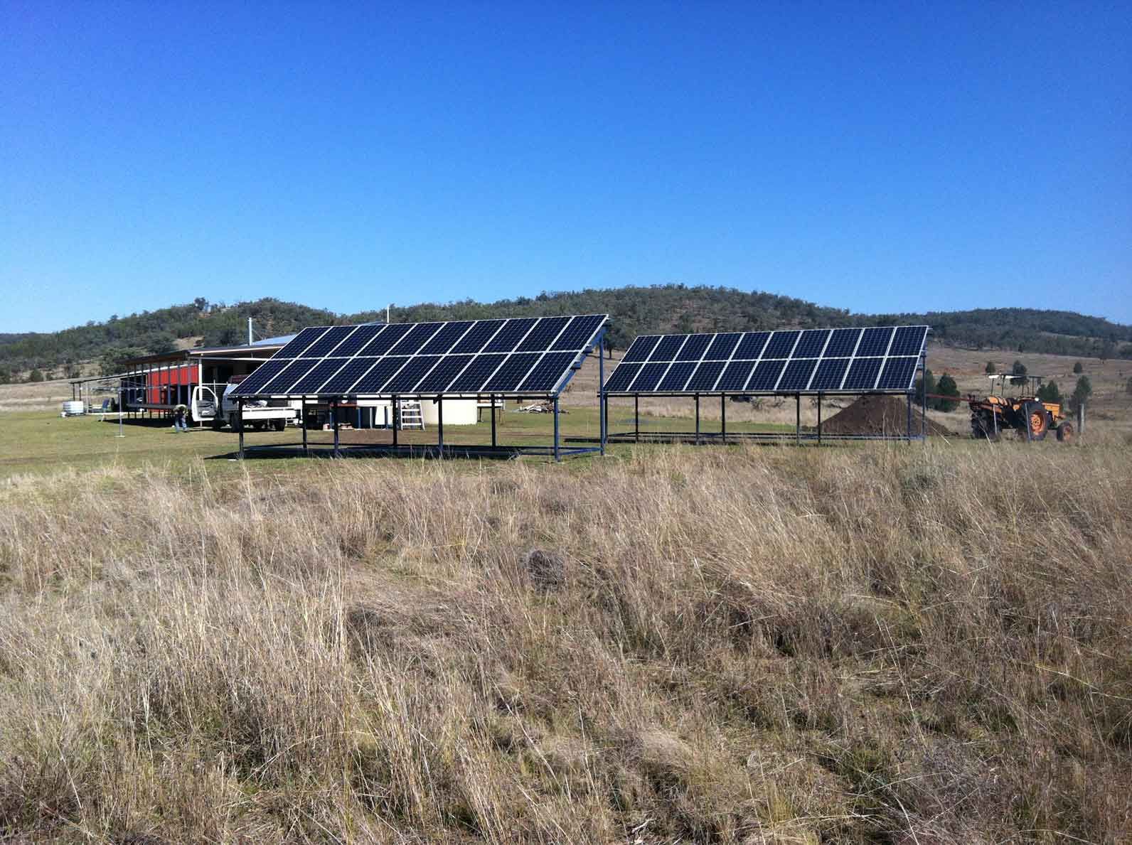 A Group of Solar Panels Are Sitting in a Field β Sapphire City Solar & Electrical In Inverell, NSW