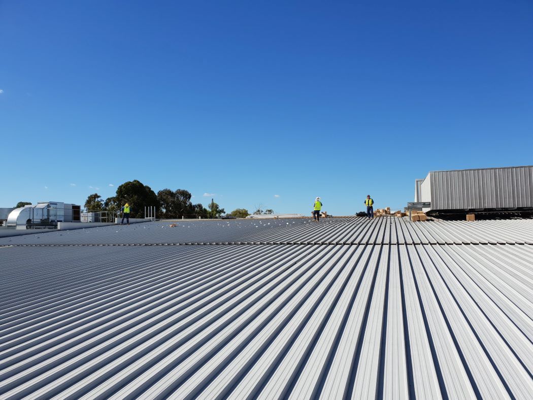 A White Roof With a Blue Sky in the Background β Sapphire City Solar & Electrical In Inverell, NSW