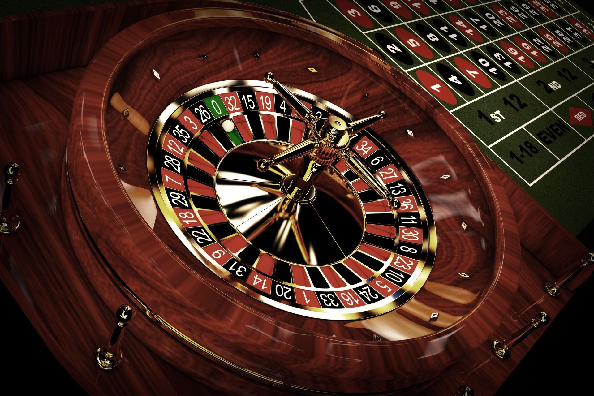 A close up of a roulette wheel on a table