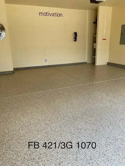 Empty garage with epoxy floor,