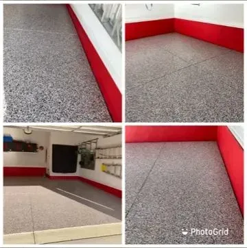 Epoxy-coated garage floor with red baseboards and white walls.