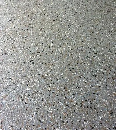 Gray speckled epoxy garage floor.