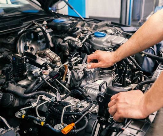 mechanic working on engine repairs 
