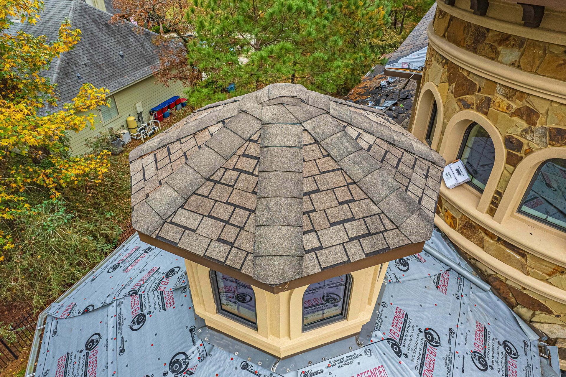 An aerial view of a house with a hexagonal roof.