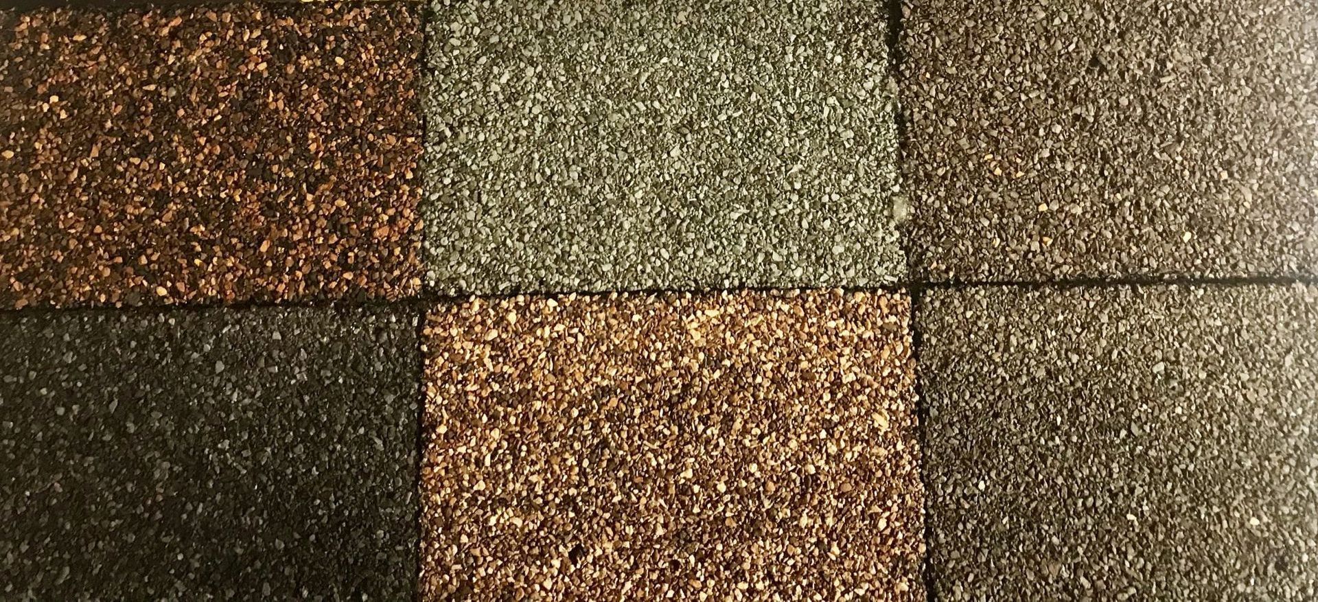 A box of landmark designer shingles in different colors