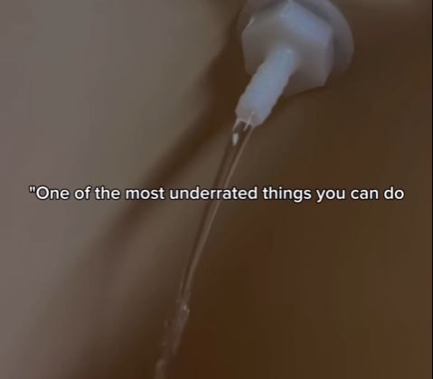 A soap dispenser with the words 