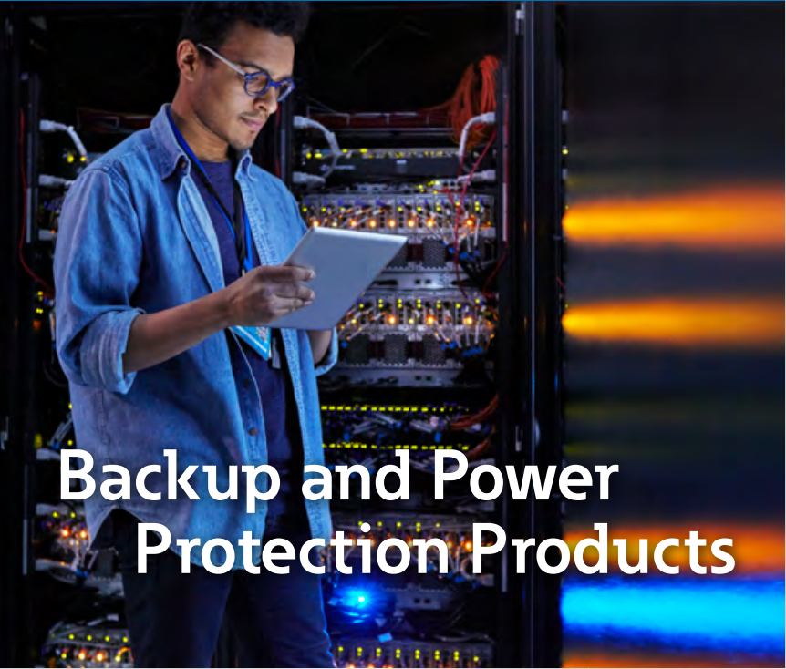 a man is looking at a tablet in a server room .