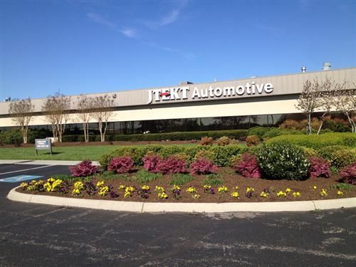A large building with the word automotive on it