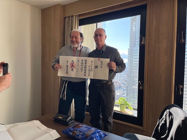 Sensei Bill Hage recieving his 5th Dan promotion