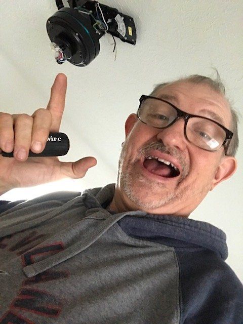A Man Pointing At Electronic Device On The Ceiling — Northfield, OH — Groppi Electric