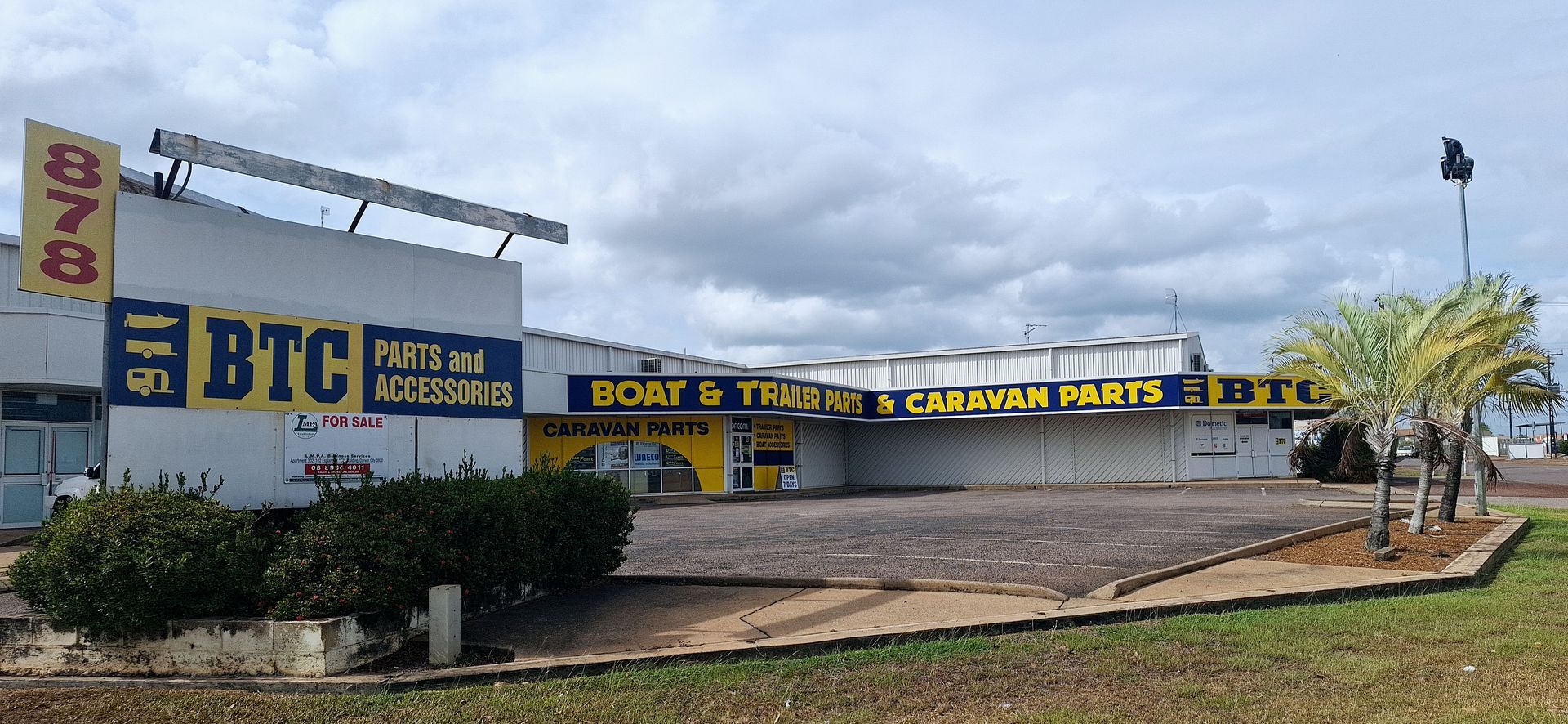 Dirt Road With Trees On Both Sides And A Blue Sky — BTC Parts & Accessories In Pinelands, NT