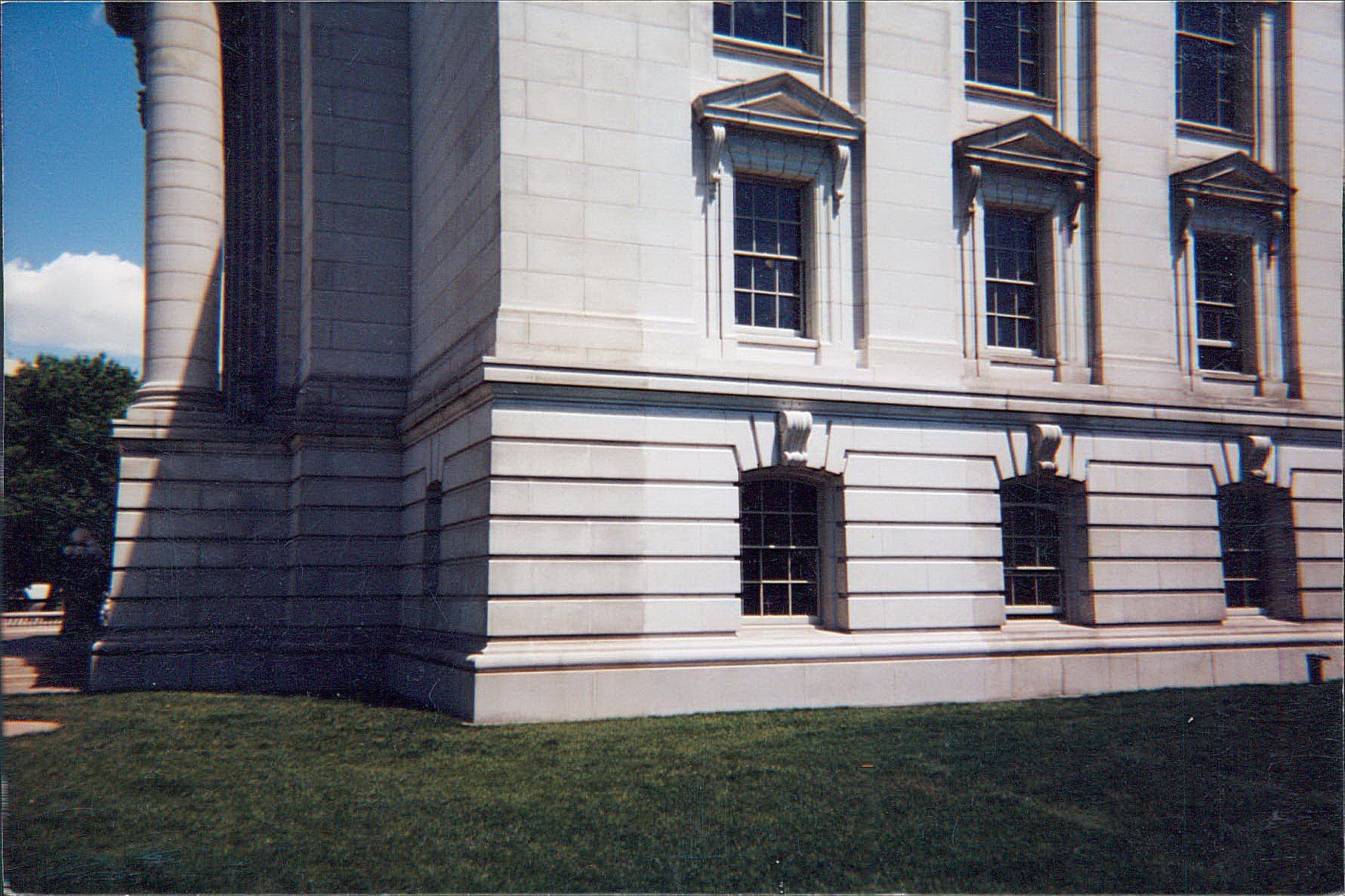 A large white building with a lot of windows