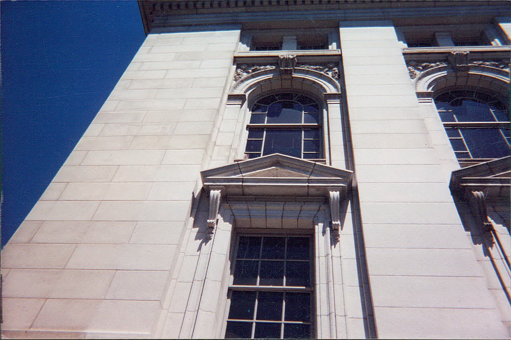 A building with a blue sky in the background