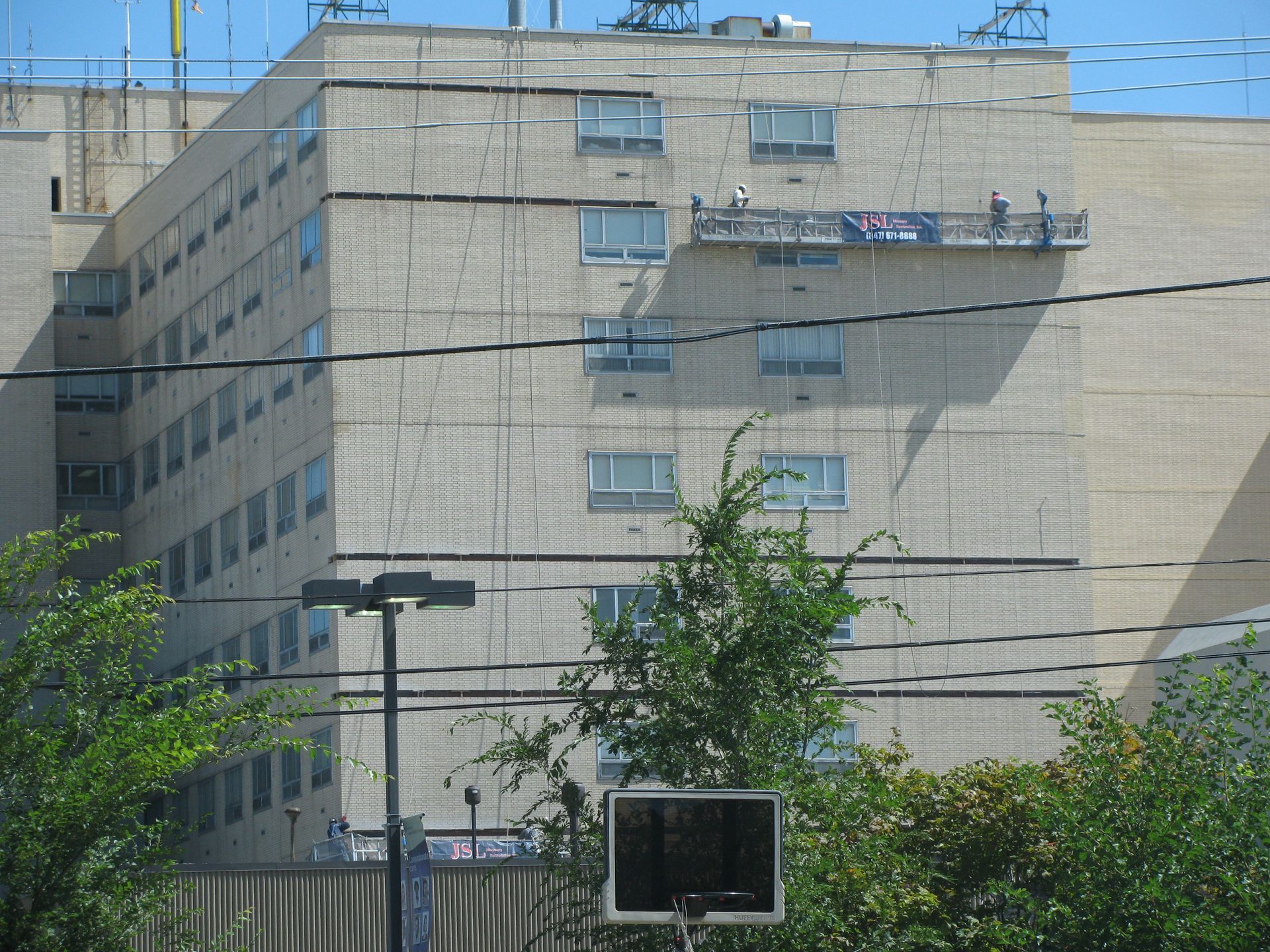 A large building with a sign that says ' ambulance ' on it