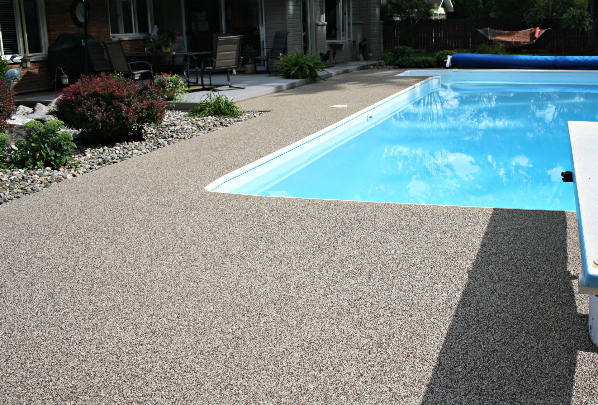 Anti slip surfaces and pool surrounds