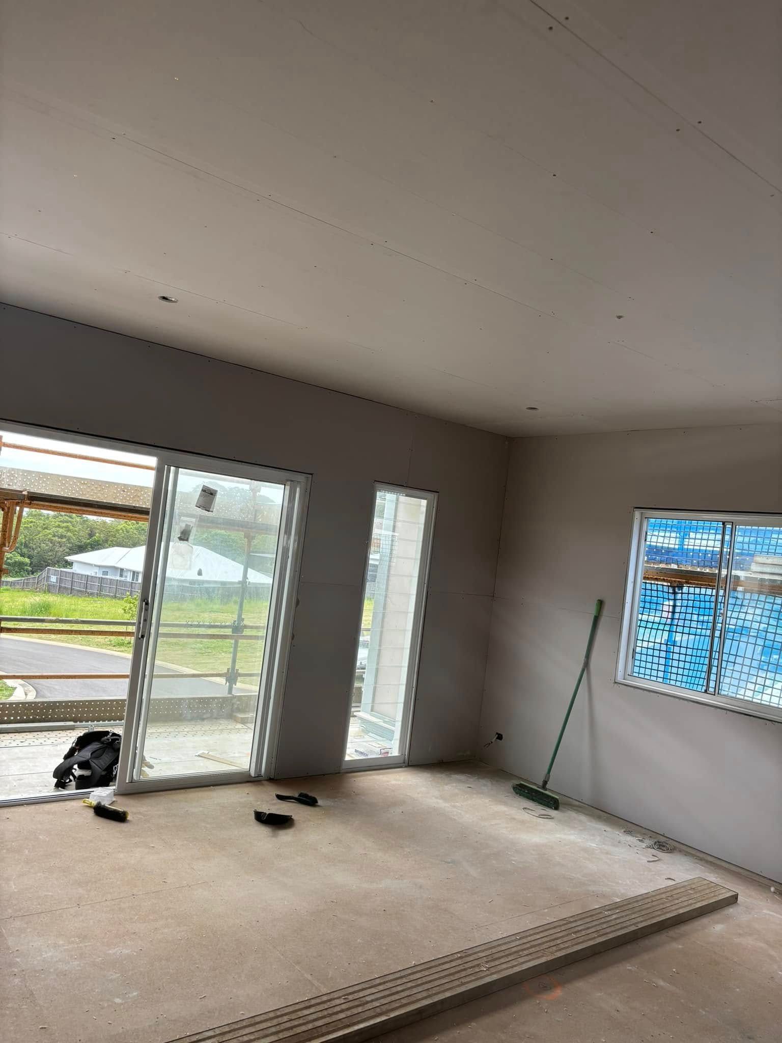 An Interior Room Under Construction With Newly Installed Drywall — HJK Plastering In South Lismore, NSW
