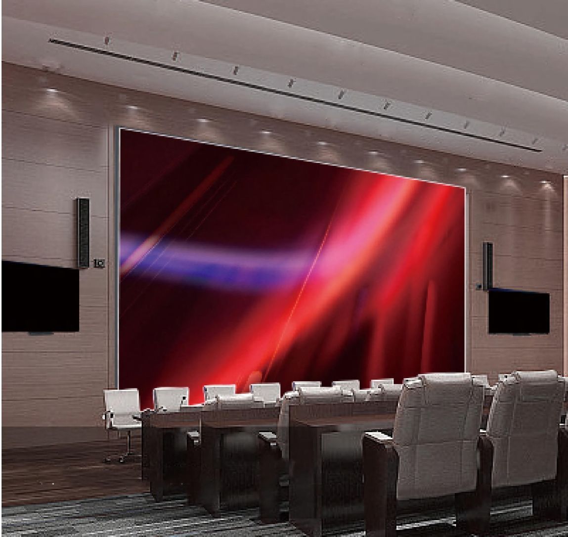 A conference room with a large screen on the wall