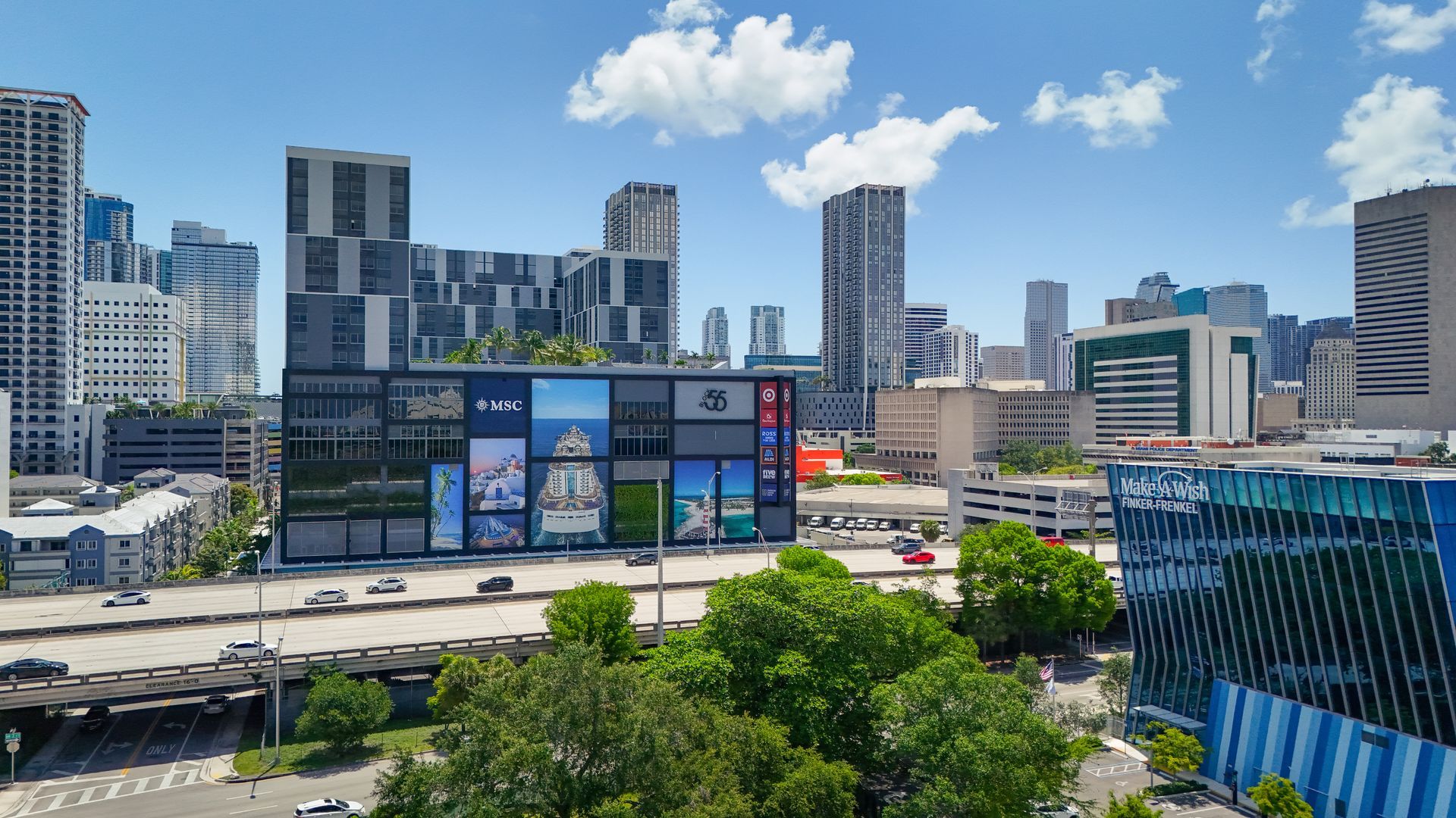 An aerial view of a city with lots of buildings and trees