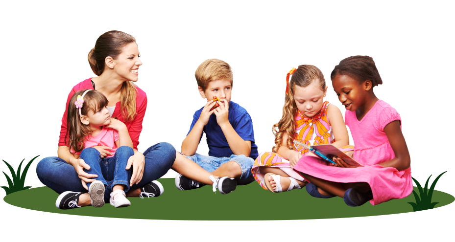 A group of children are sitting on the grass with a teacher.