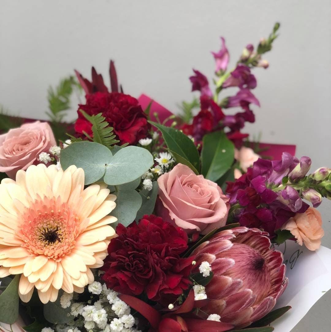 A Bouquet Of Flowers Including Roses And Daisies — Clover Country Flowers and Gifts In Highfields, QLD