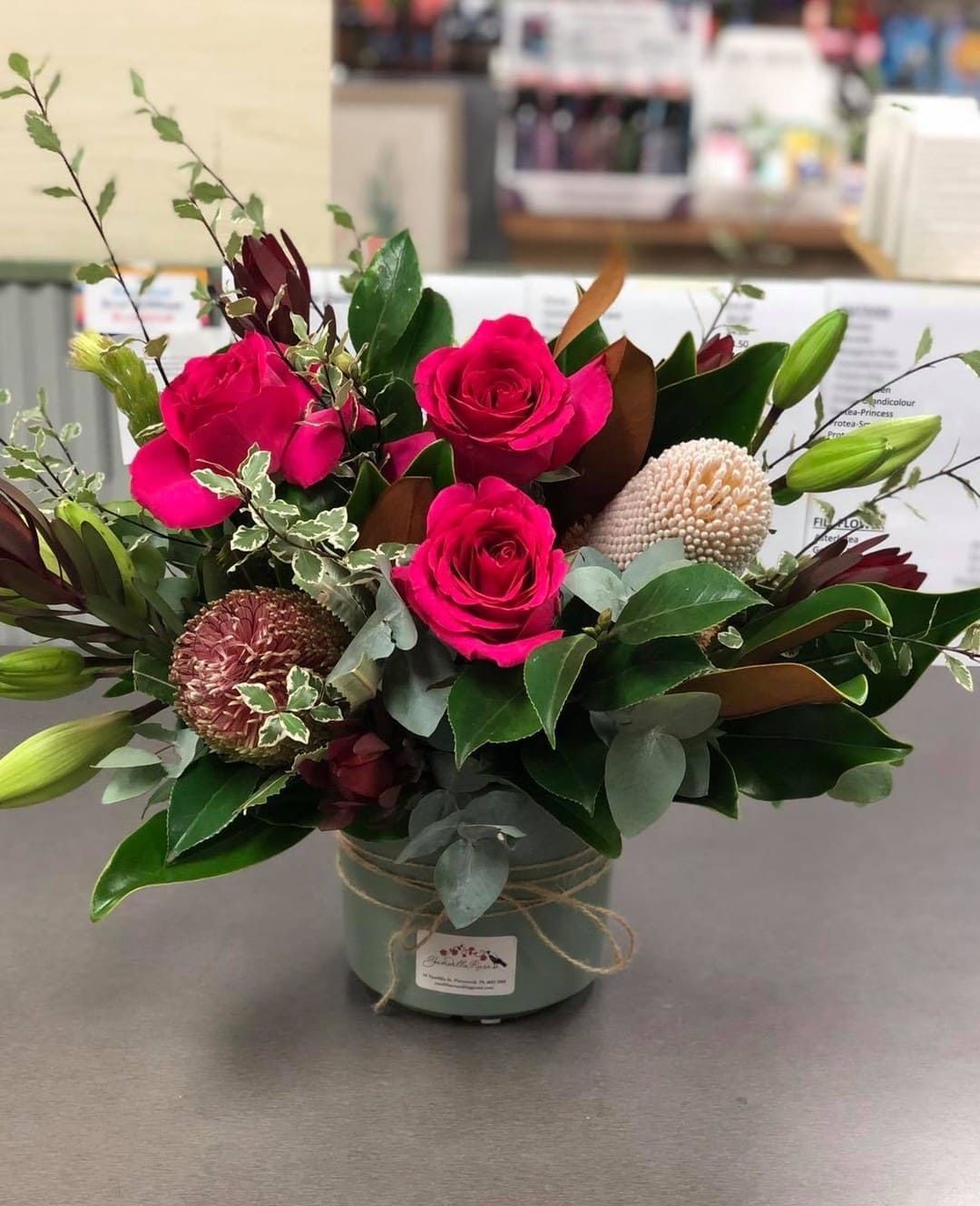 A Vase Filled With Pink Roses And Other Flowers — Clover Country Flowers and Gifts In Highfields, QLD