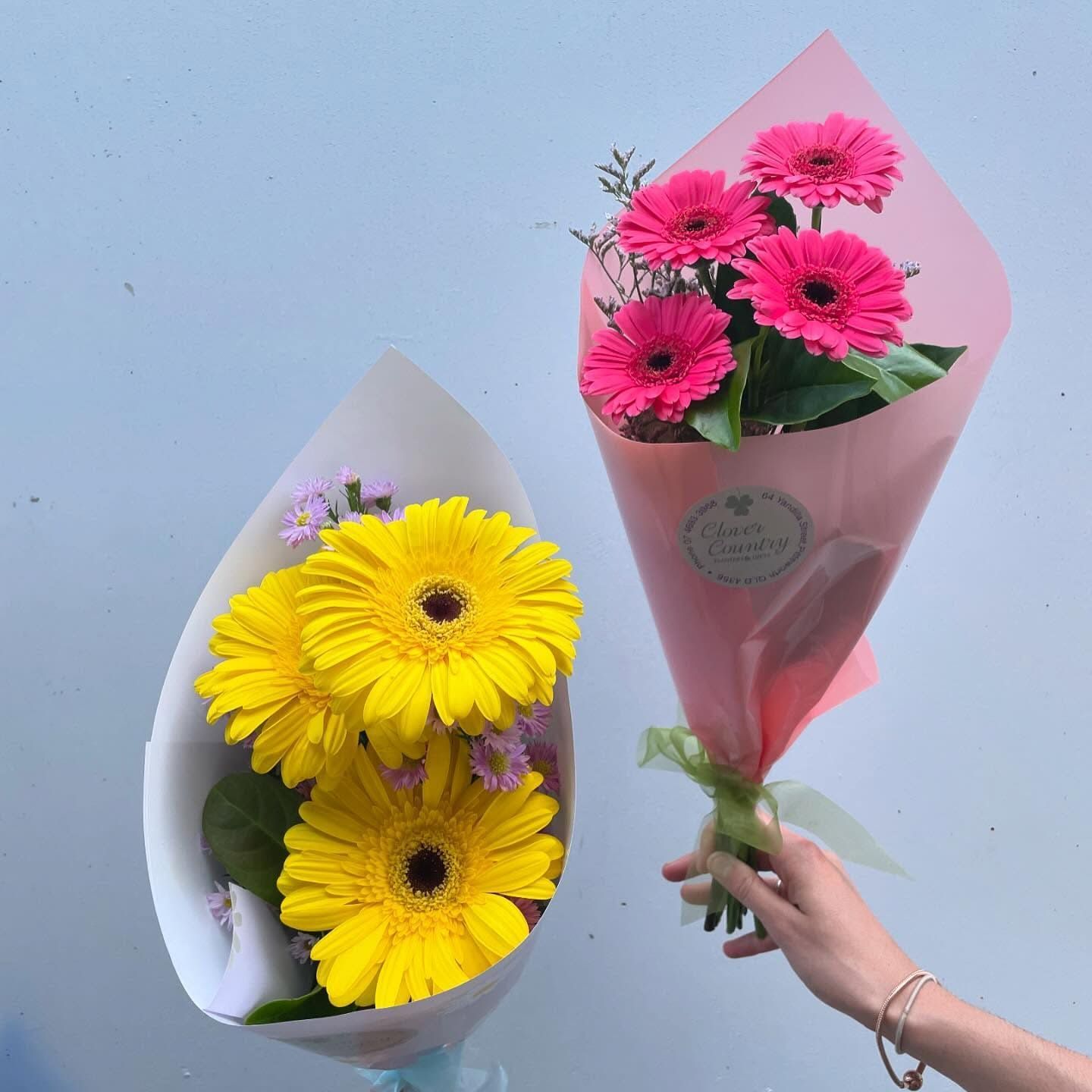 A Bouquet Of Yellow Flowers Next To A Bouquet Of Pink Flowers — Clover Country Flowers and Gifts In Pittsworth, QLD