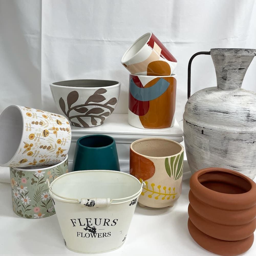 A Group Of Pots With One That Says Fleurs Flowers On It — Clover Country Flowers and Gifts In Pittsworth, QLD