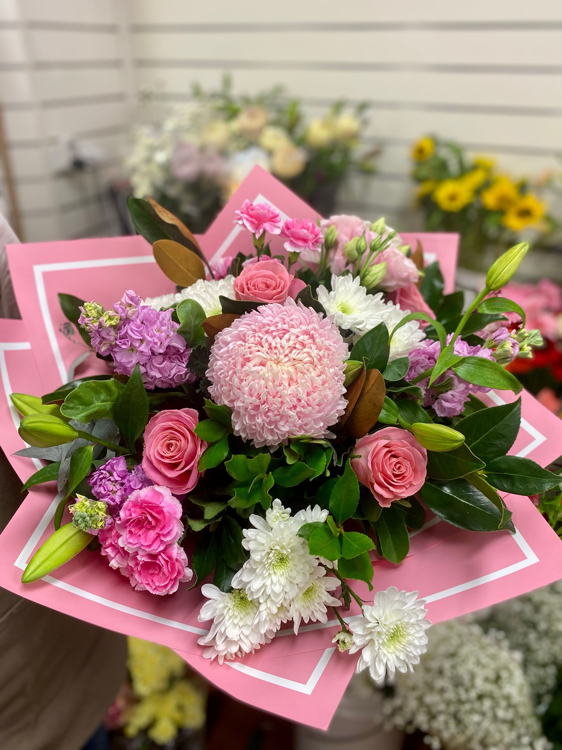 A Bunch Of Pink And Purple Flowers Are In A Pink Box โ Clover Country Flowers and Gifts In Pittsworth, QLD