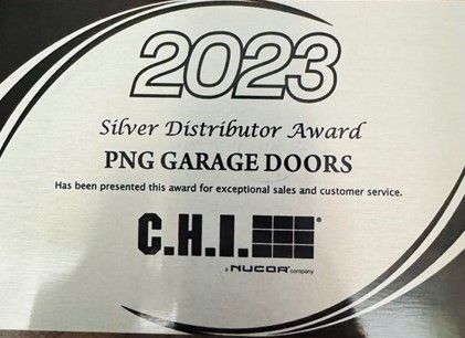 A silver distributor award for png garage doors has been presented for exceptional sales and customer service.