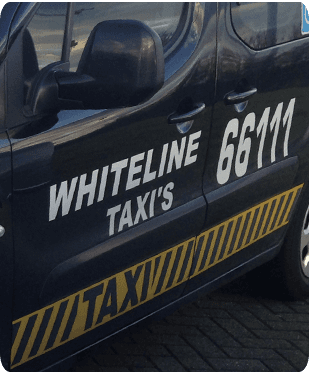 Close up of the side of a black taxi