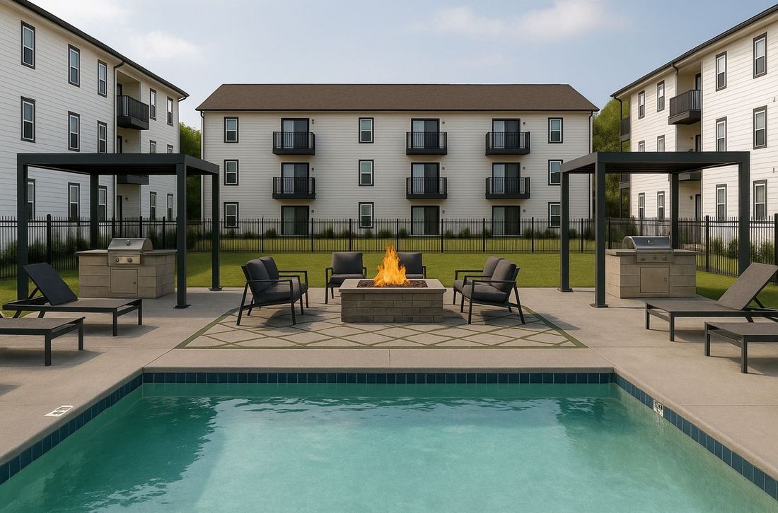 Pool area with fire pit and grilling stations in front of apartments.