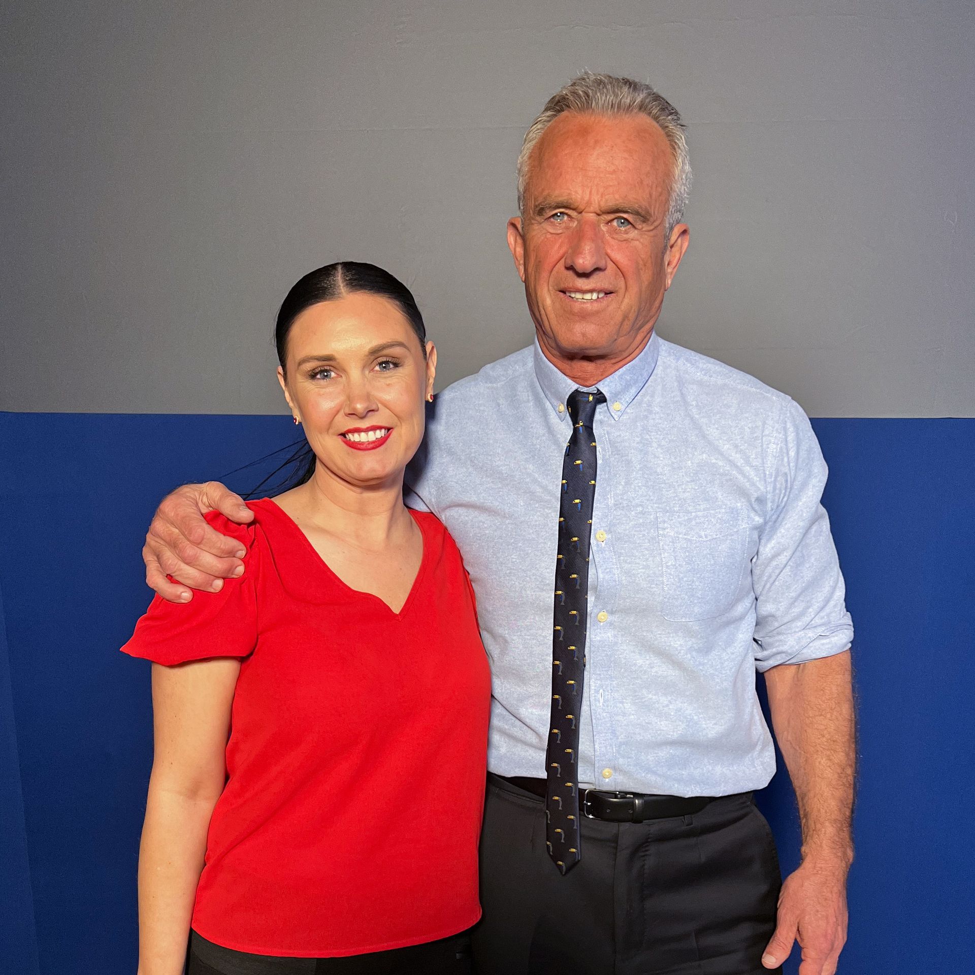 A man and a woman are posing for a picture together